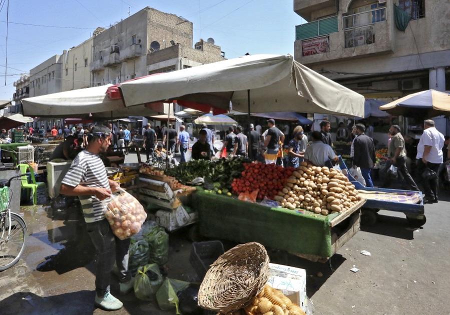 حرب التصريحات بين البرلمان وعلاوي تزيد إقبال العراقيين على الدينار