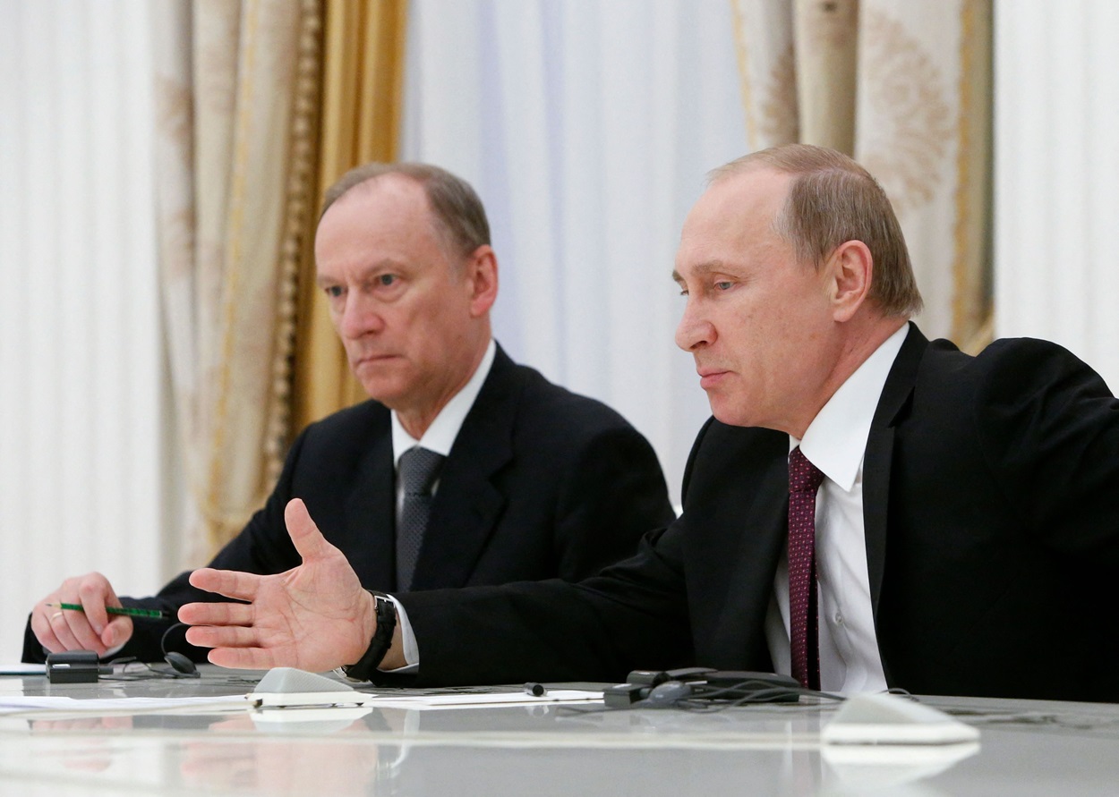 Putin accompanied by Security Council Secretary Nikolai Patrushev_getty.jpg