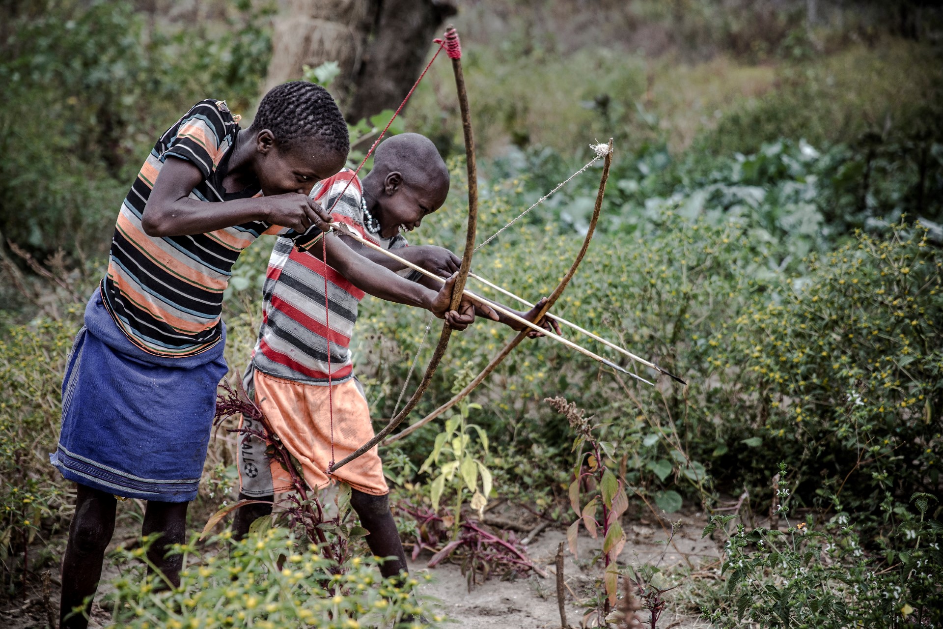 AFP__20200213__1OW92W__v5__Preview__TopshotYoungPastoralistBoysPlayWithHandCraftedBo.jpg