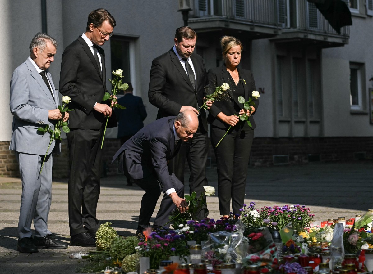 AFP__20240826__36EV4QG__v1__Preview__GermanyCrimeFestivalSolingen.jpg