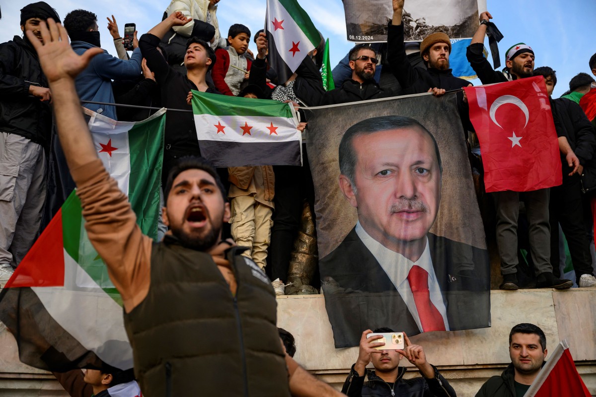 AFP__20241208__36PW96M__v1__Preview__TurkeySyriaPoliticsConflictDemo.jpg