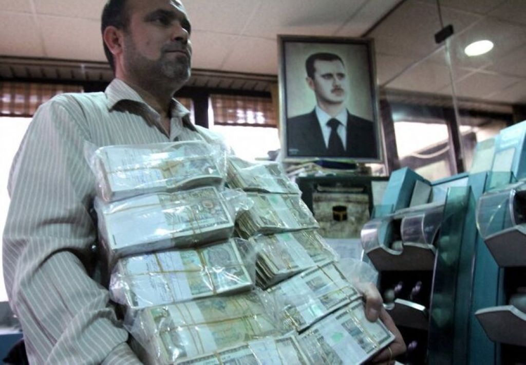 afp__20120620__nic6068814__v3003__preview__syriaeconomyfinanceunrest_720.jpg