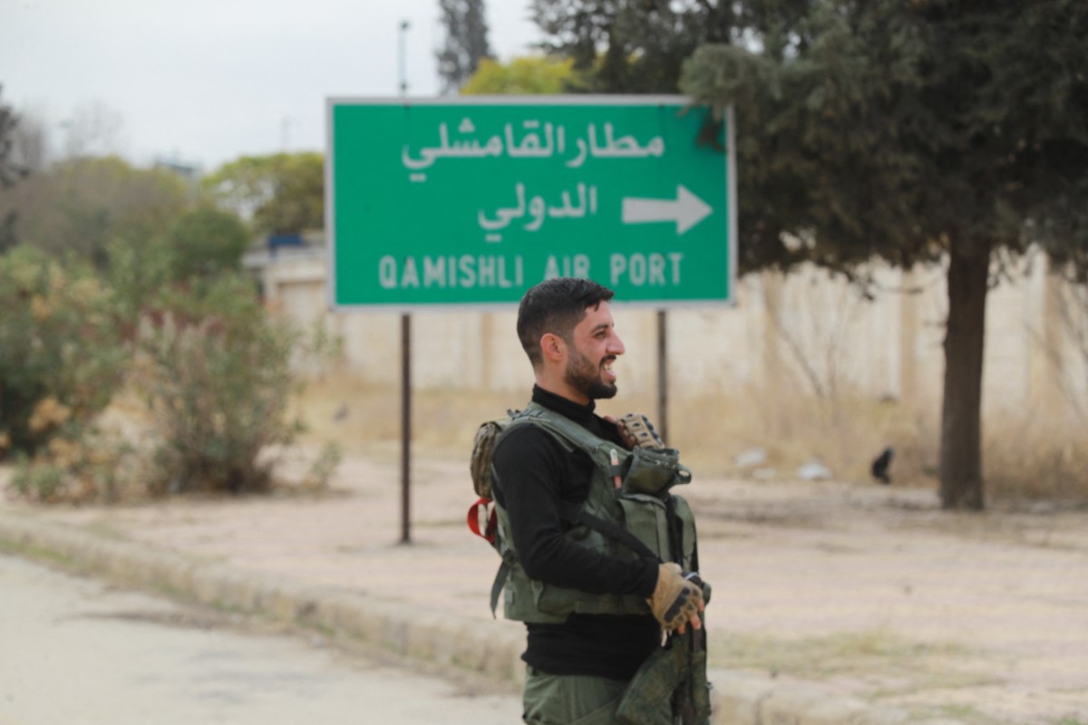 AFP__20241208__36PT7L2__v1__Preview__SyriaConflictKurdsAirport.jpg